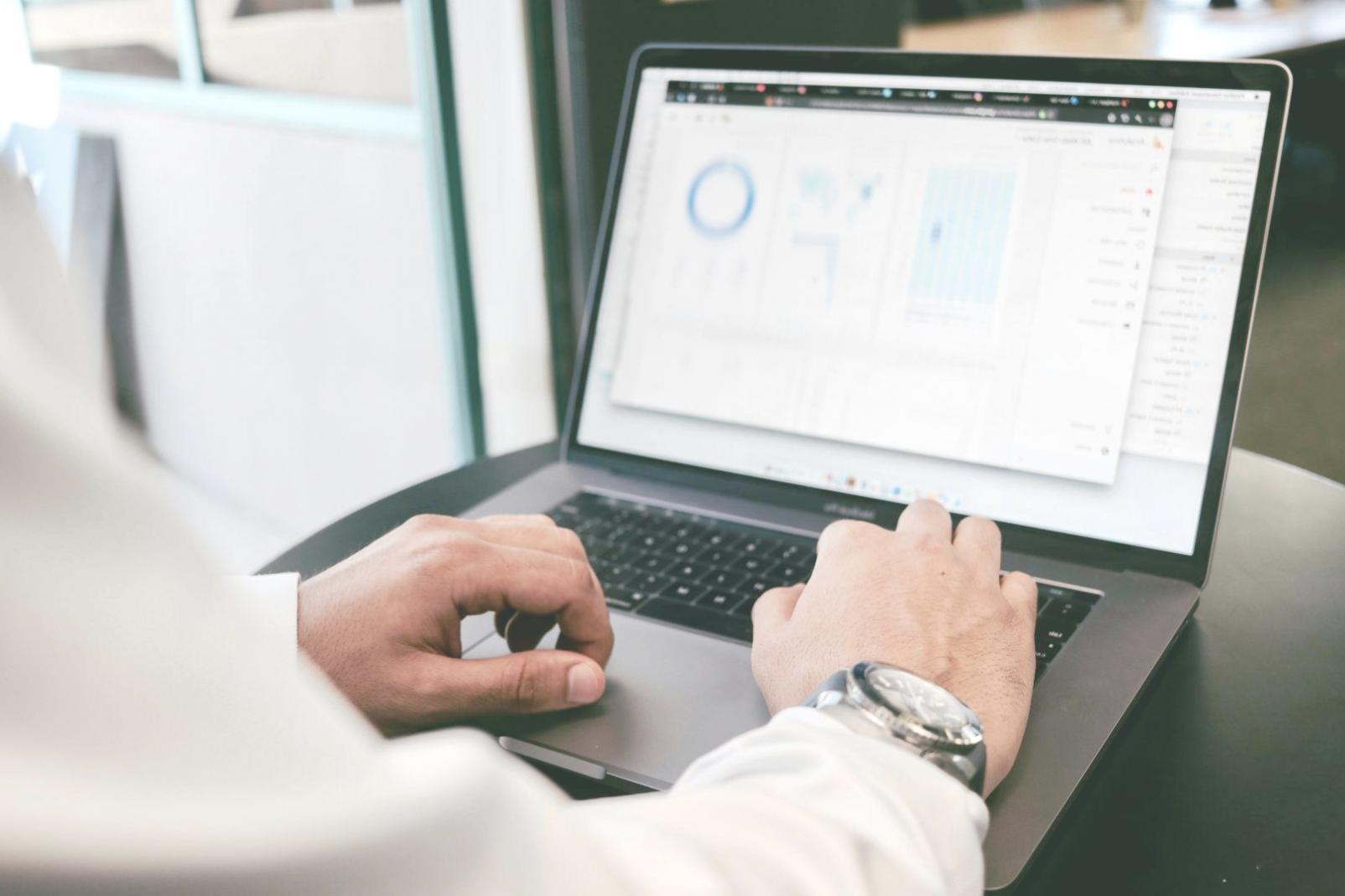 Professional budget planning workspace with financial documents and calculator